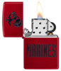 Zippo U.S. Marine Corps Candy Apple Windproof Lighter with its lid open and lit.
