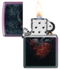 Zippo Dark Heart Design Iridescent Windproof Lighter with its lid open and lit.