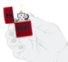 Zippo U.S. Marine Corps Candy Apple Windproof Lighter lit in hand.