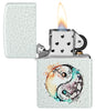 Zippo Floral Yin and Yang Design Glacier Windproof Lighter with its lid open and lit.