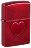 Front shot of Zippo Stamped Heart Design Candy Apple Windproof Lighter standing at a 3/4 angle.