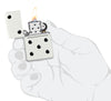 Zippo Domino Design White Matte Windproof Lighter lit in hand.