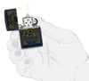 Zippo Elements Design Navy Matte Windproof Lighter lit in hand.
