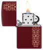 Zippo Heart Garland Design Merlot Windproof Lighter with its lid open and lit.