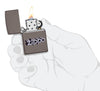 Zippo 3D Logo Design Black Ice® Windproof Lighter lit in hand