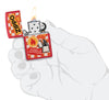 Zippo Retro Design Red Matte Windproof Lighter lit in hand.